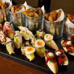 Selection of open sandwiches and potato wedges, part of the meetings food options available at Mercure hotels
