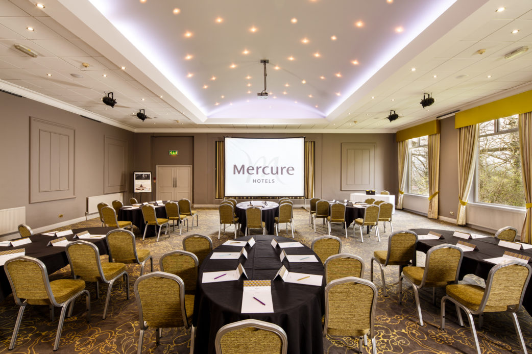 Tables dressed for a meeting in the ballroom on the park