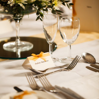 Detail of table dressing for a wedding in the ballroom on the park