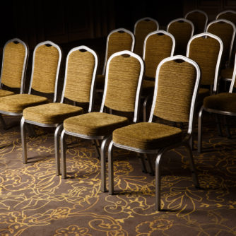 Chairs arranged ready for a wedding in the park suite at Mercure Bradford Bankfield Hotel