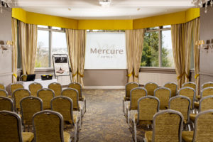 Chairs arranged ready for a wedding in the park suite at Mercure Bradford Bankfield Hotel