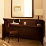Double bed and desk in a superior room at Mercure Bradford Bankfield Hotel