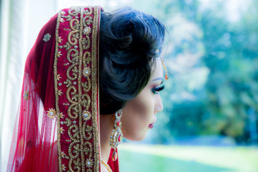 Bride at Mercure Bradford Bankfield Hotel in traditional Asian bridal dress.